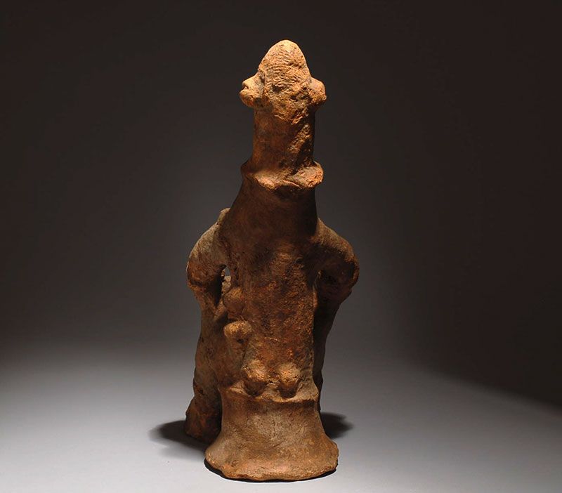 very rare, large pottery figure of a seated deity from the Bankoni