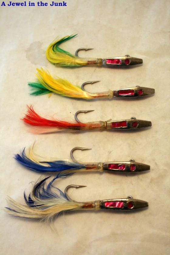 Ounce Lead Jigs Multiple colored feathers Used Sold As Is