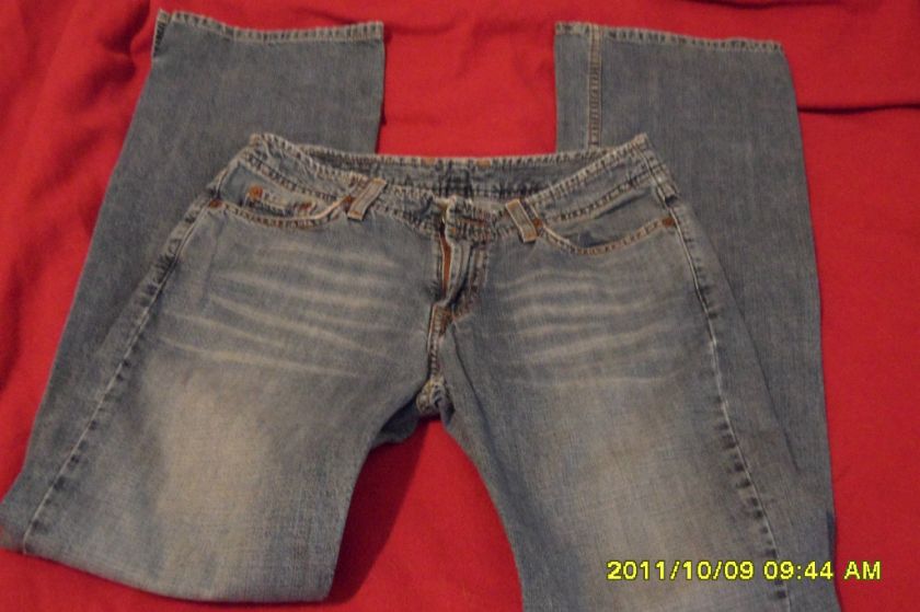   leg, medium reg length jeans 2/26 with slits on the bottoms  