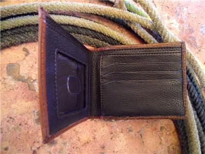 THIS HANDSOME WESTERN WALLET IS MADE OF GENUINE LEATHER. THE QUALITY 