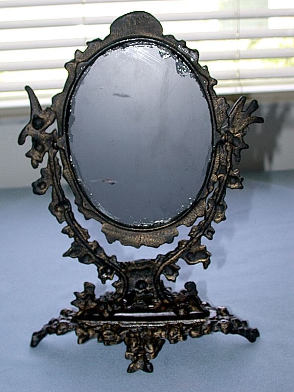   auction is for an Antique Metal Victorian Swivel Vanity Table Mirror