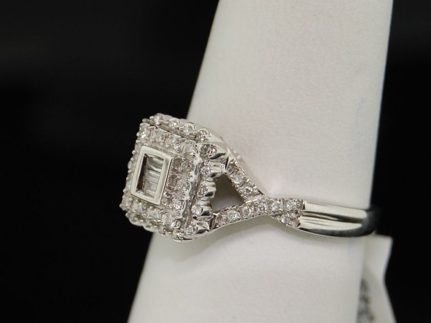 LADIES WHITE GOLD .25C BAGUETTE DIAMOND FASHION RING  