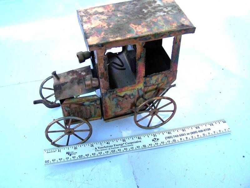 vintage metal toy car with music box hood moves  