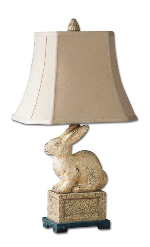   ivory pedestal. The rectangle bell shade is hand sewn linen textile