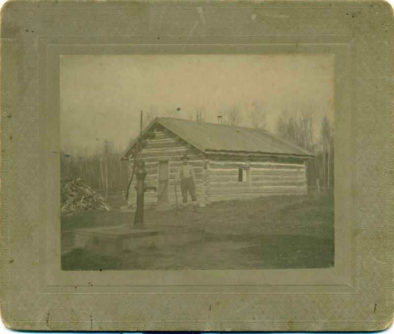 early iowa log cabin settler w/henry? rifle poses nice  