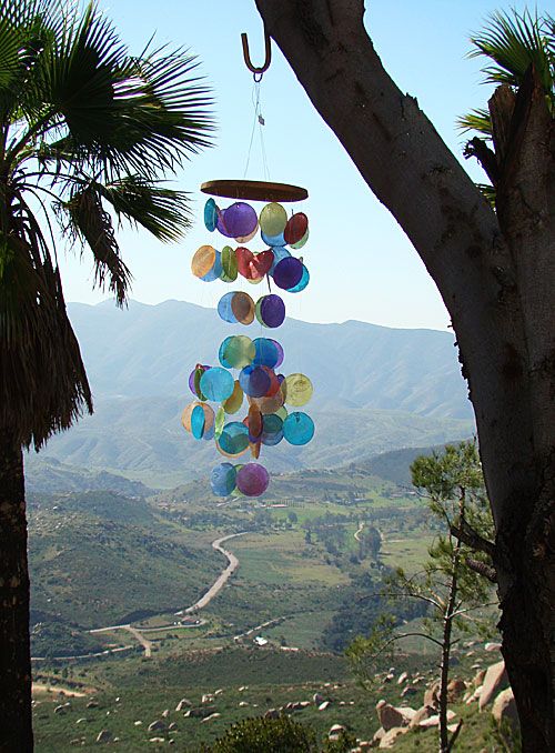 Each chime is strung by hand with heavy gage fish line, to a sturdy 